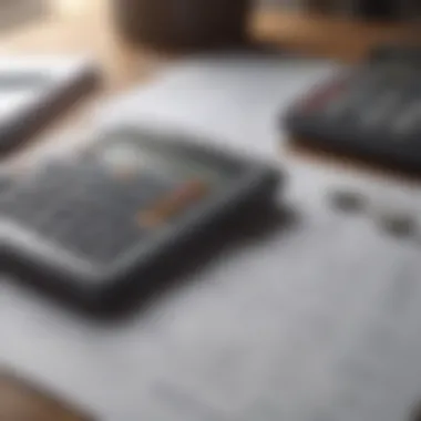 Evaluating Financial Risks A financial calculator with paperwork